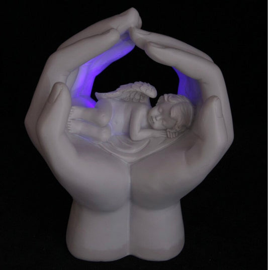 LED sleeping cherub