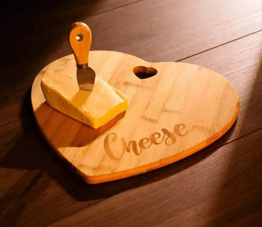 Heart cheese board with knife
